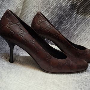 Gucci double G embossed heels dark brown